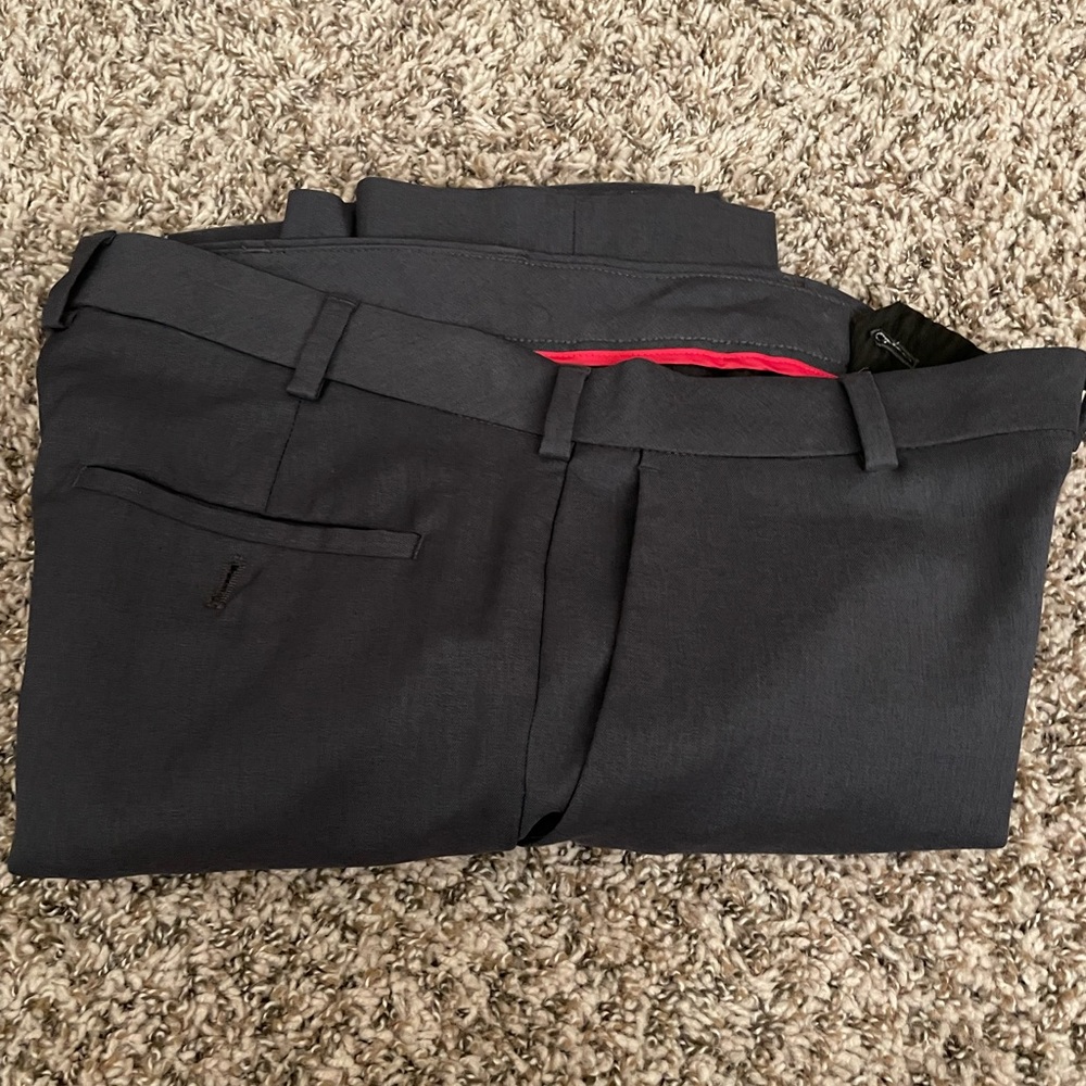 Dark grey, slim dress pants size 30x30 from Van Heusen.